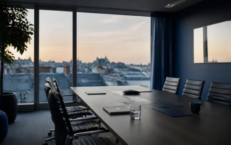 Salle de réunion vitrée d’une entreprise de services numériques donnant sur des toits parisiens